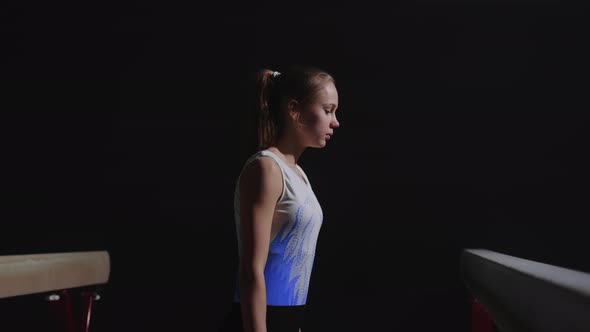 Junior Female Sportsperson Portrait in Gymnastic Hall Teen Girl is Wearing Sportswear is Walking alt