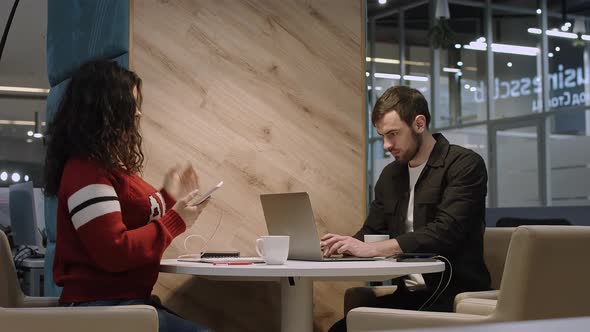 Young Businessmen are Working in an Office Space alt