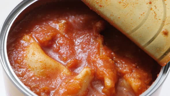 Canned food ravioli in tomato sauce  slow tilt 4K 2160p 30fps UltraHD footage - Filled with meat pas alt