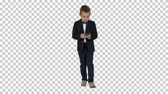 Small Boy in Costume Walking and Using Smartphone, Alpha Channel alt