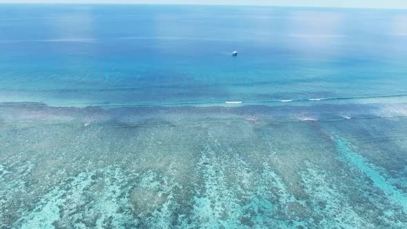 Maldive Reef with Turquoise Blue Water Aerial View