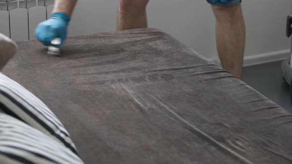 Professional Cleaner Cleaning the Sofa and Pillows alt