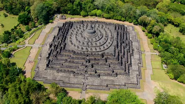 Borobudur Buddhist temple complex in Yogjakarta Java, Indonesia. Aerial top-down orbit alt