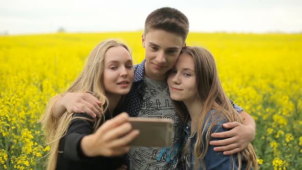 Teenager Friends Posing and Taking Selfies alt