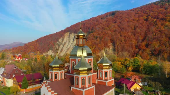  Aerial Drone Video of Orthodox Church with Gilded Domes in Yaremche in Carpathians Mountains alt