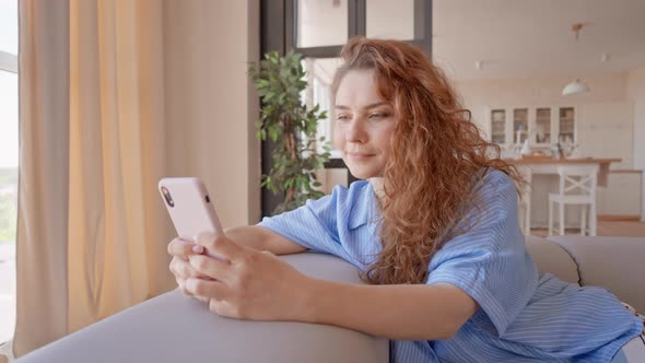 Lady Using Device Browsing on Mobile in Flat