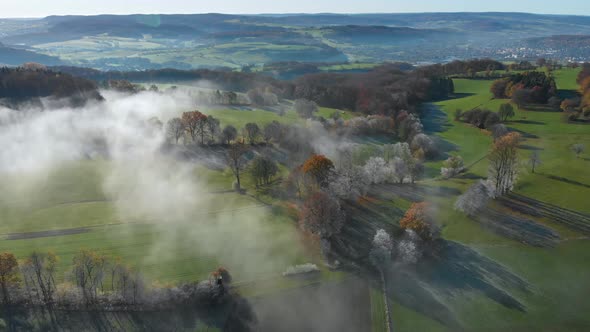 spectacular view over misty lush green valley alt