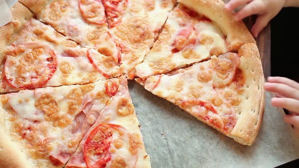 People Hands Taking Slices Of Pizza Margherita alt
