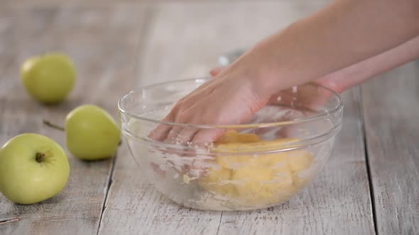 Chef'S Hands Knead Dough At The Kitchen. alt