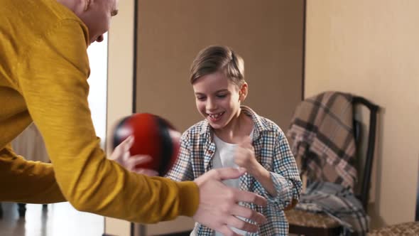 Caucasian boy working out with punching bag