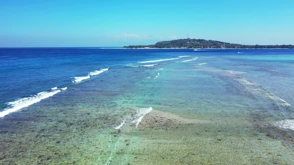 Aerial sky of perfect shore beach voyage by blue sea with white sand background of a dayout near ree alt