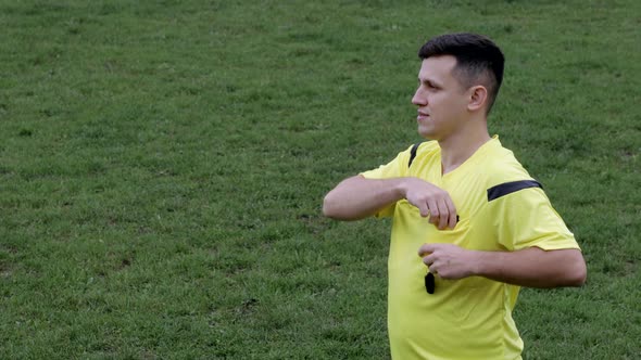 Referee showing a yellow, red cards and removing player while gaming alt