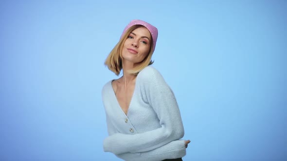 Woman in Casual Clothes Dancing on Color Background