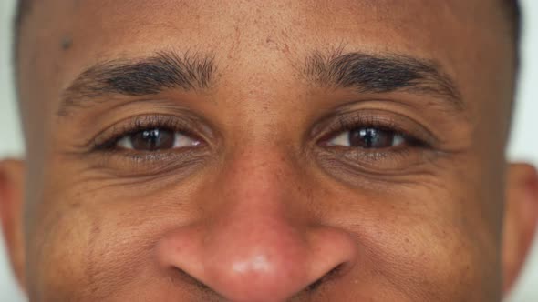 Close-up of a Black Man's Eyes. Eyes of a Thoughtful Man alt