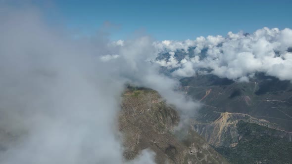 Drone flight in the Colca Canyon dawn with clouds alt