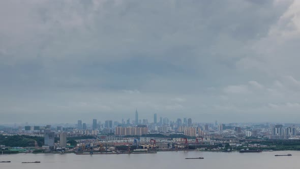 Time lapse of yangtze river skyline in nanjing city,china ,cloudy day alt