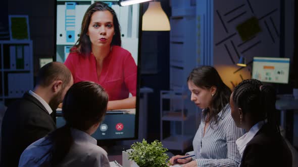 Workaholics Overworked Multiethnic Businesspeople Discussing with Remote Manager During Online alt