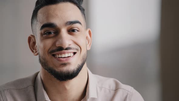 Dreaming Arabic Handsome Young Man Agent Worker Deep in Thoughts Look Away Turn Head at Camera Happy alt