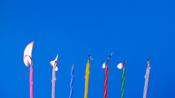 Birthday Candles on Blue Background  Stock Footage