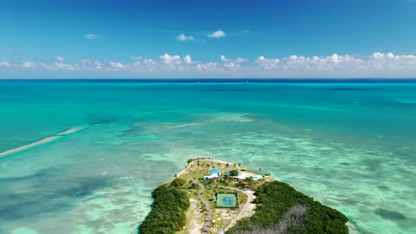 Private Beach Resort With Recreation Area In Tea Table Key Island, Islamorada, Florida. aerial pullb alt