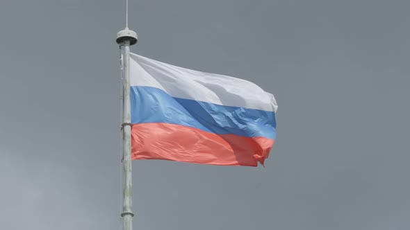 State flag of Russian Federation on the sky background