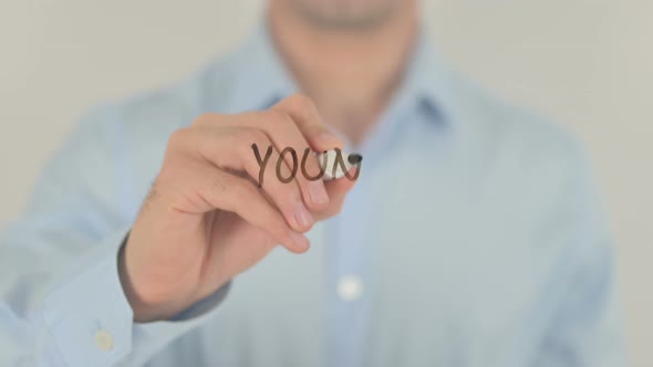 Young Entrepreneur, Man Writing on Transparent Screen alt