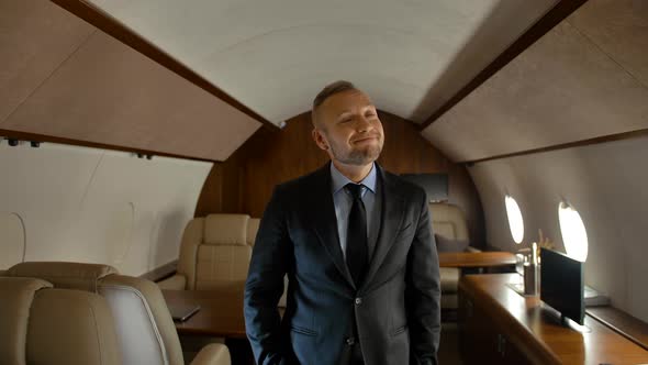 Businessman Fly on His Private Jet alt