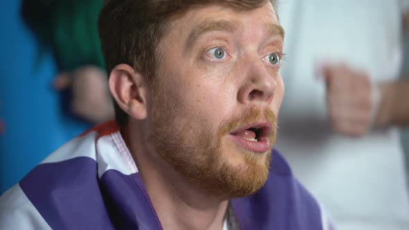 Smiling Man Waving Great Britain Flag, Watching Sports Game, Supporting Team alt