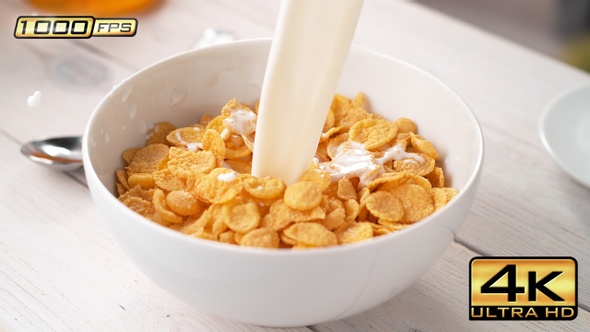Pouring Milk into Bowl of Cornflakes alt