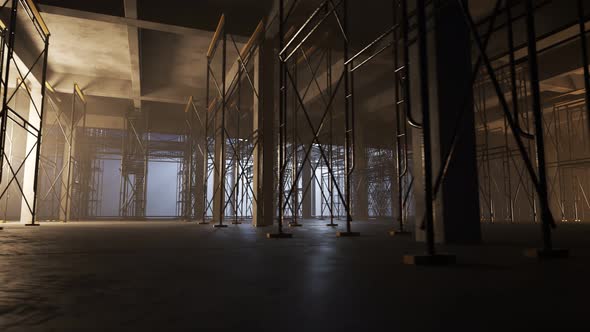 Reinforced concrete building construction site. The floor with scaffolding. alt