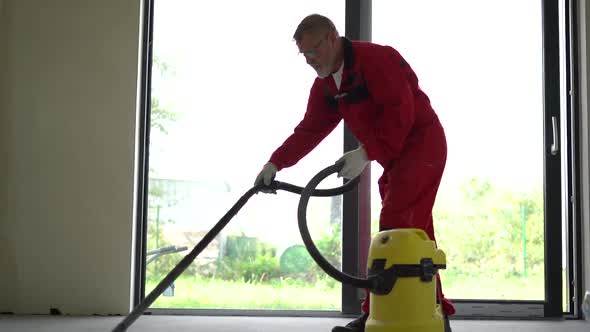 Portrait of a Mature Man in Orange Jumpsuit alt