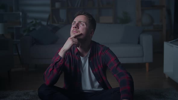 A Young Man Comes Up with an Idea and a Bright Magical Light Comes on Above Him alt