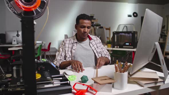 African Engineer Working on 3D Printing Project alt