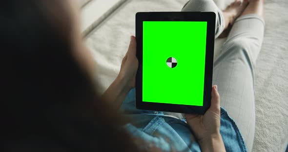 Woman Holding Tablet Chromakey Indoors