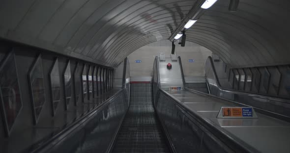 Going down escalators no people on London Underground, Coronavirus Lockdown alt