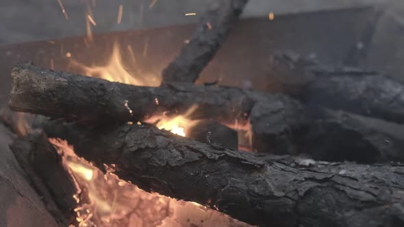 Slow-motion shot of the wood burning in the fire