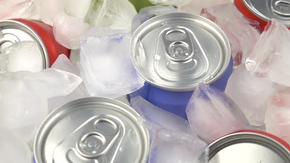 Cans of soft drink in the ice