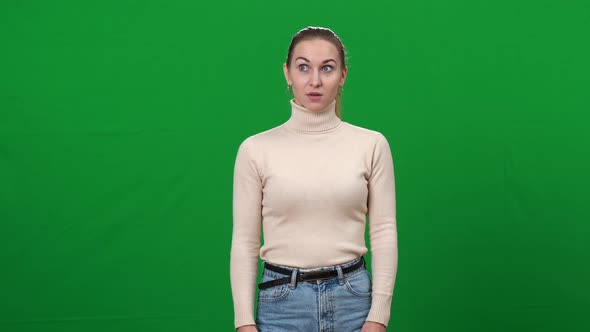 Bored Disinterested Woman Imitating Gun Shot at Temple on Green Screen alt