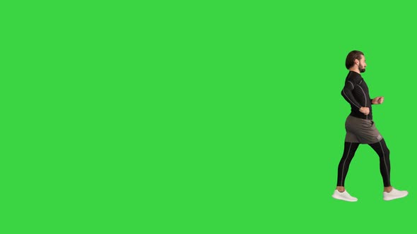 Man Walking By Race Walking on a Green Screen Chroma Key alt