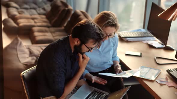 Coworkers Brainstorm In Corporate Online.Two Colleagues Talking In Office About Business Project. alt