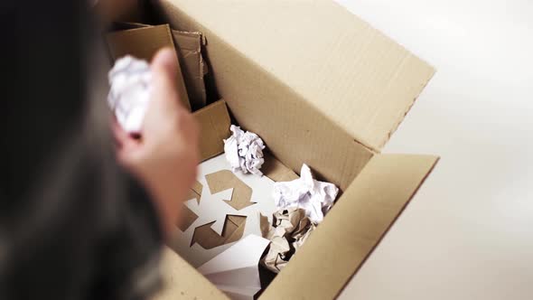 Throwing Paper Waste Into A Special Box For Sorting Recyclable Material Product, Reusing Paper alt