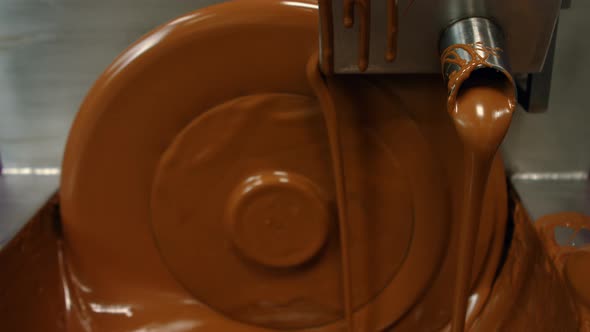 Close-up of chocolate blending machine alt