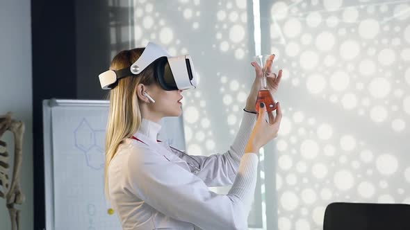 Female Scientist in white Gown which Working with Flask with Chemical Solution Using Virtual Reality alt