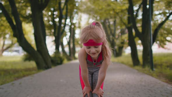 Tired Athletic Fitness Sport Runner Child Girl Taking Break After Jogging Training Finishing Race alt