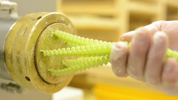 Production of Pasta - Machine Produce Pasta - Closeup (Detail) alt