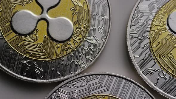 Rotating shot of Ripple Bitcoins (digital cryptocurrency) - BITCOIN RIPPLE 0006 alt