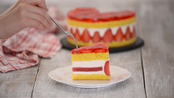 Piece of Fresh Baked Cake with Strawberry Jelly Topping