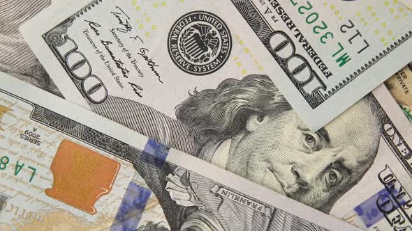 Closeup on the Bills for a US Hundred Dollar Banknote Fragment of Dollar Bill alt