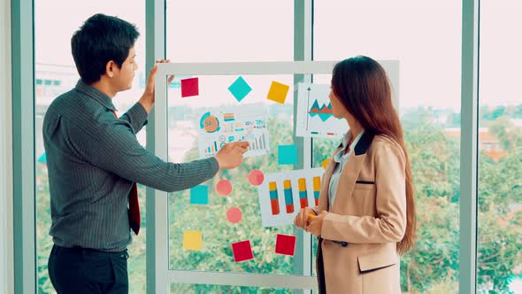 Business People Work on Project Planning Board alt