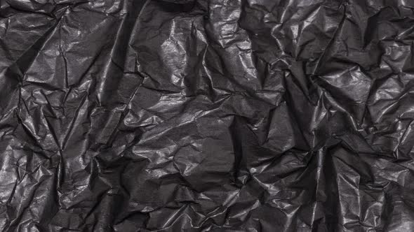 Crumpled paper sheet seamless texture, copy space, stop motion graphic